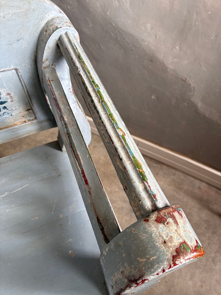 Close-up of Vintage Long Painted Hungarian Bench showcasing its distressed blue finish and layers of colorful paint.