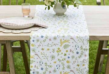 Hares and Meadow Table Runner by Source for the Goose, featuring florals and hares on a cotton fabric.