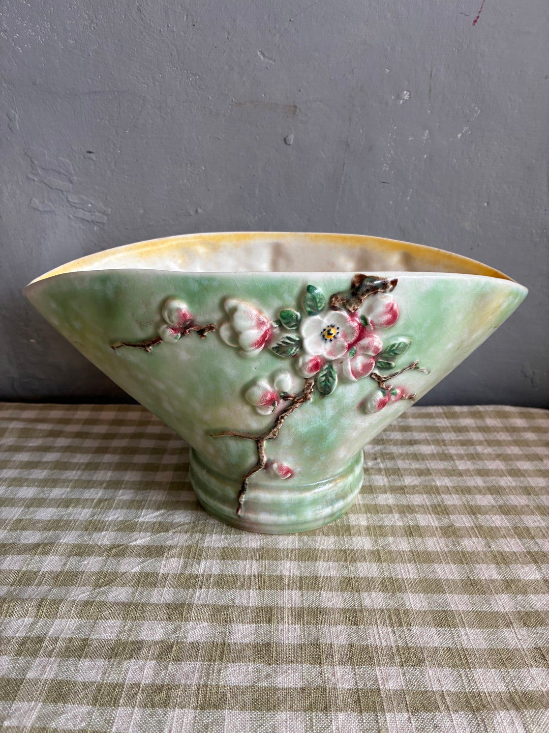 Vintage Sylvac Apple Blossom Vase featuring pink and white blossoms on a green background, perfect for a mantle or table display.