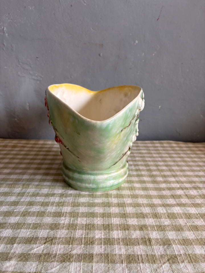 Vintage Sylvac Apple Blossom Vase showcasing soft pink and white blossoms with green background, perfect for decor.