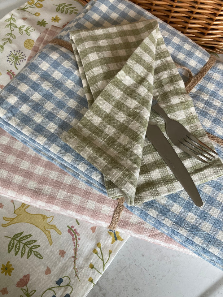 Pale Olive Gingham Napkin Set displayed with blue and pink checked napkins, perfect for rustic table settings.