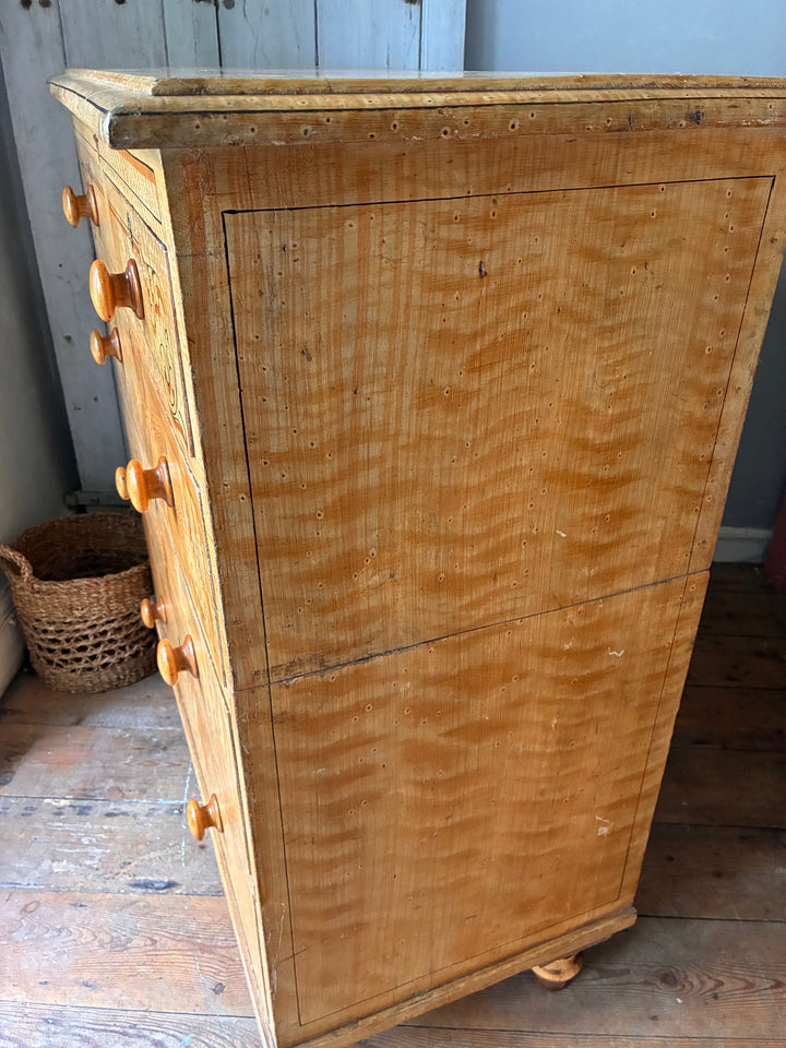19th Century Scumbled Pine Chest of Drawers showcasing its traditional craftsmanship and faux wood grain effect.