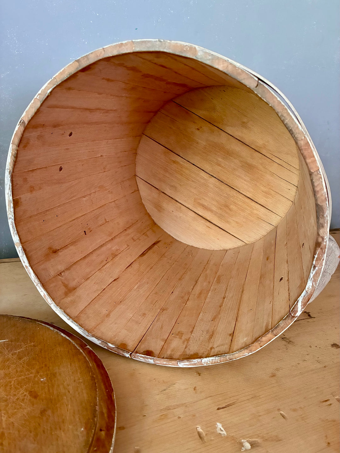 Inside view of a Folk Art Painted Wooden Firkin - Round Bin showcasing the rustic wooden finish and craftsmanship.