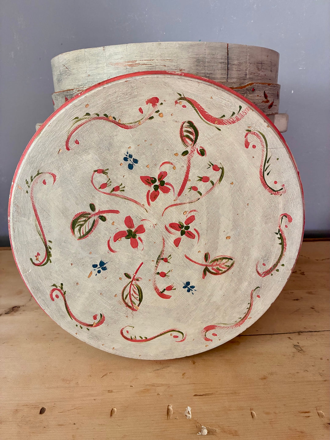 Folk Art Painted Wooden Firkin - Round Bin featuring naive folk art design with floral patterns on distressed background.