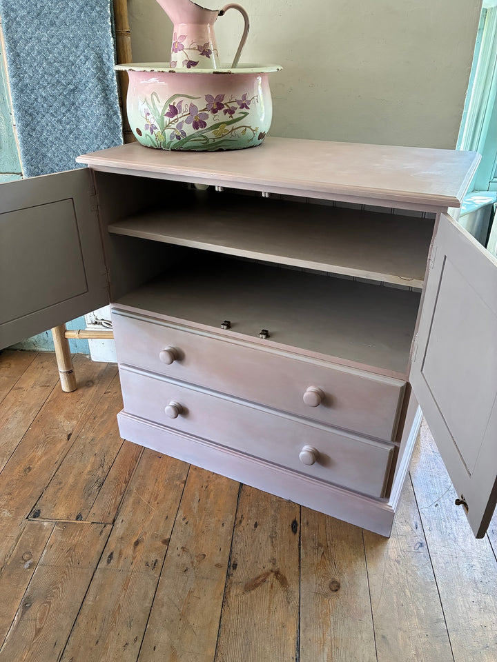 Pretty painted cupboard with drawers and heather tones, handcrafted by Source for the Goose, Devon.