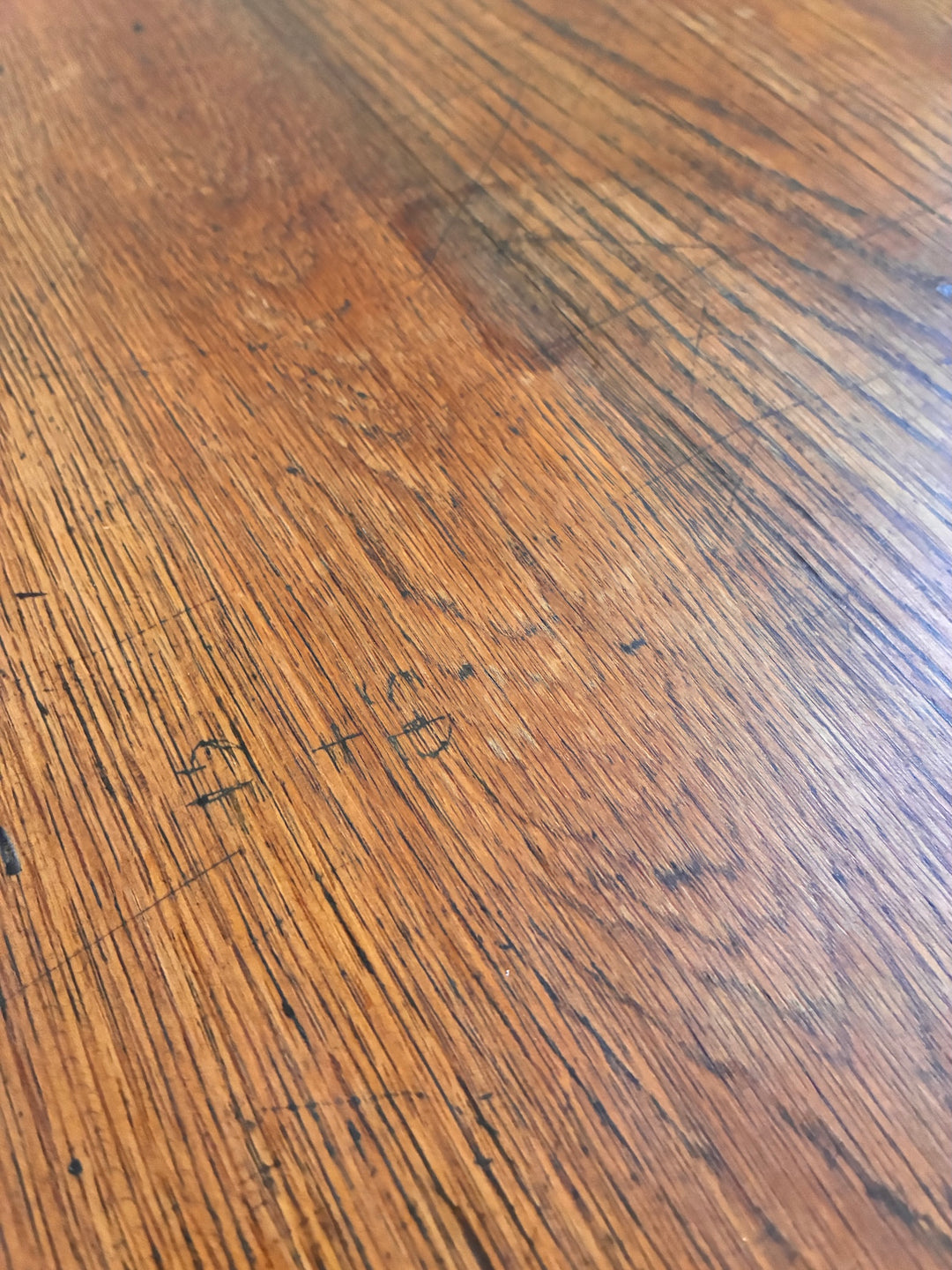 Vintage Painted Desk - Amsterdam Green table surface showcasing rich wood grains and vintage markings.