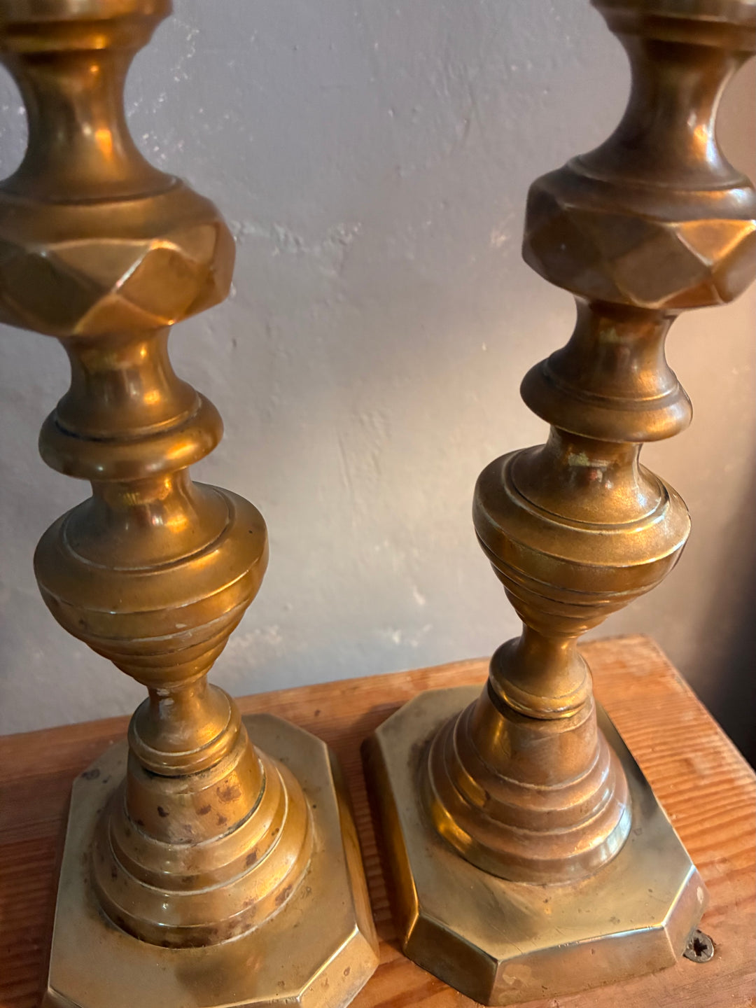 Pair of Antique Brass Candlesticks showcasing intricate detailing and authentic patina from Source for the Goose, Devon.