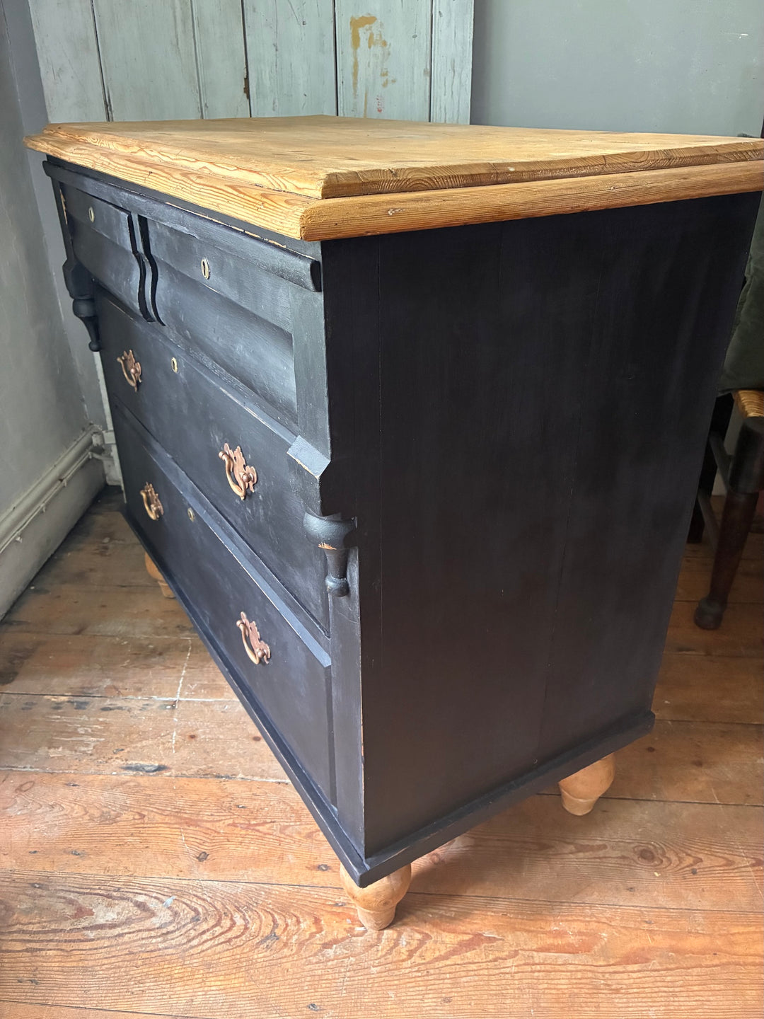 Rustic Pine Chest of Drawers - Ebonised Paint showcasing charm with two over two drawers and decorative quarter columns.