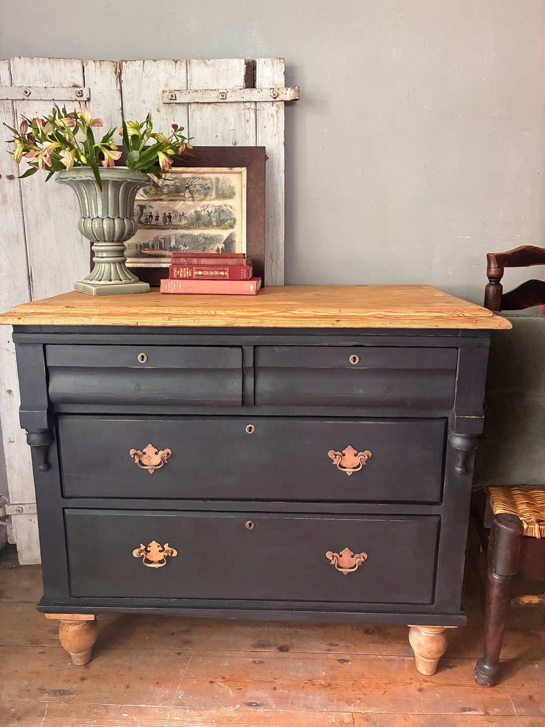 Rustic Pine Chest of Drawers - Ebonised Paint showcasing timeless charm and character in a cozy home setting.