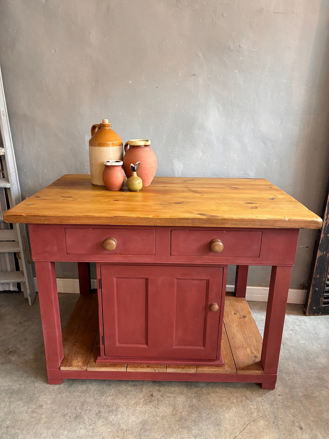 Pine Kitchen Island with Painted Base featuring butcher's block top and red painted base from Source for the Goose Devon.