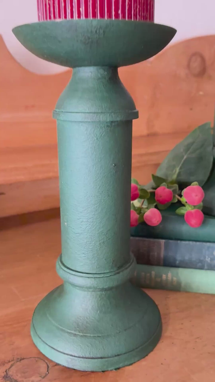 Pair of Vintage Green Metal Candlesticks on a wooden surface, featuring a sculptural design perfect for vintage home decor.