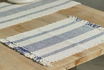 blue stripe placemat on wooden table top