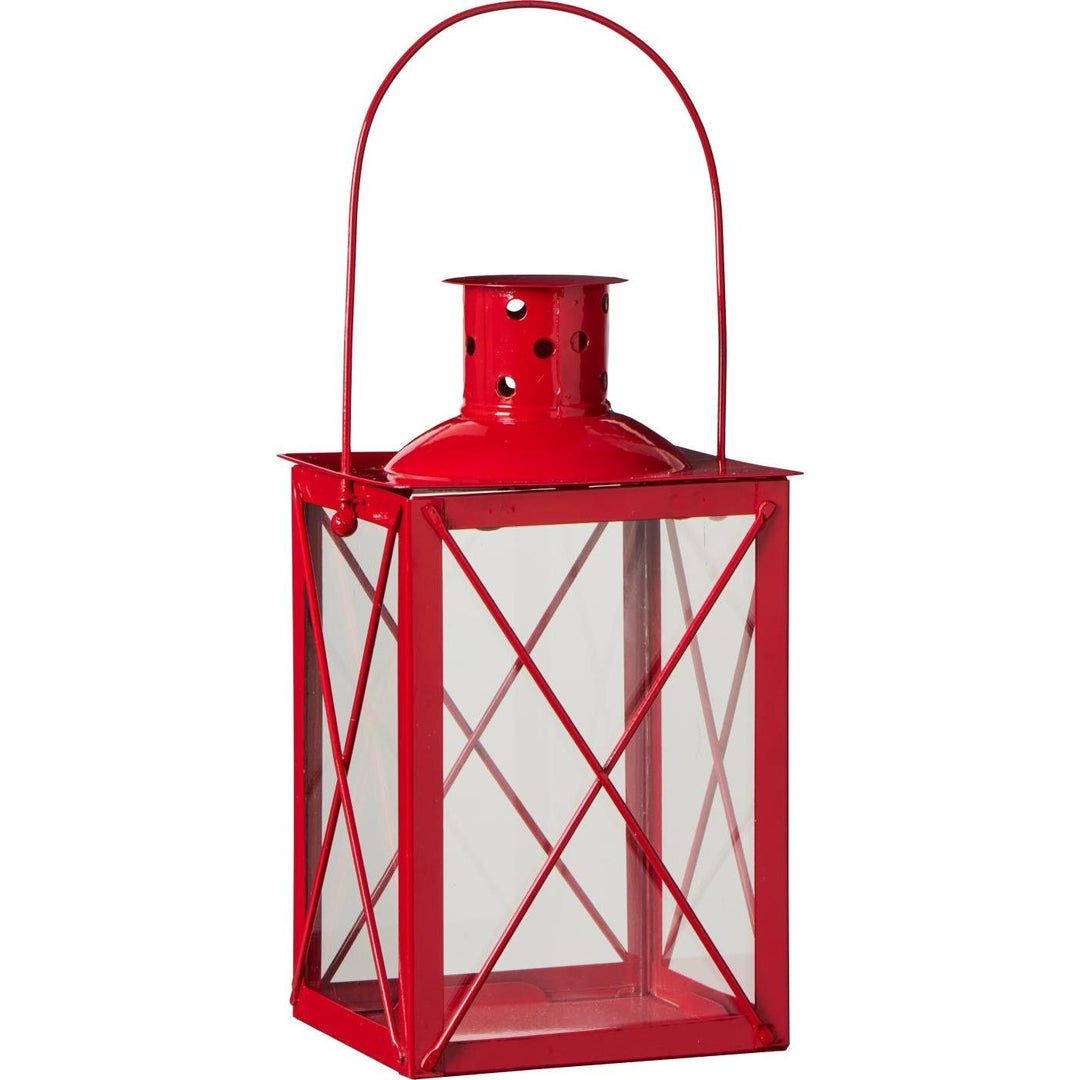 Red metal lantern with chimney by Source for the Goose, adding warmth for autumn and winter evenings.