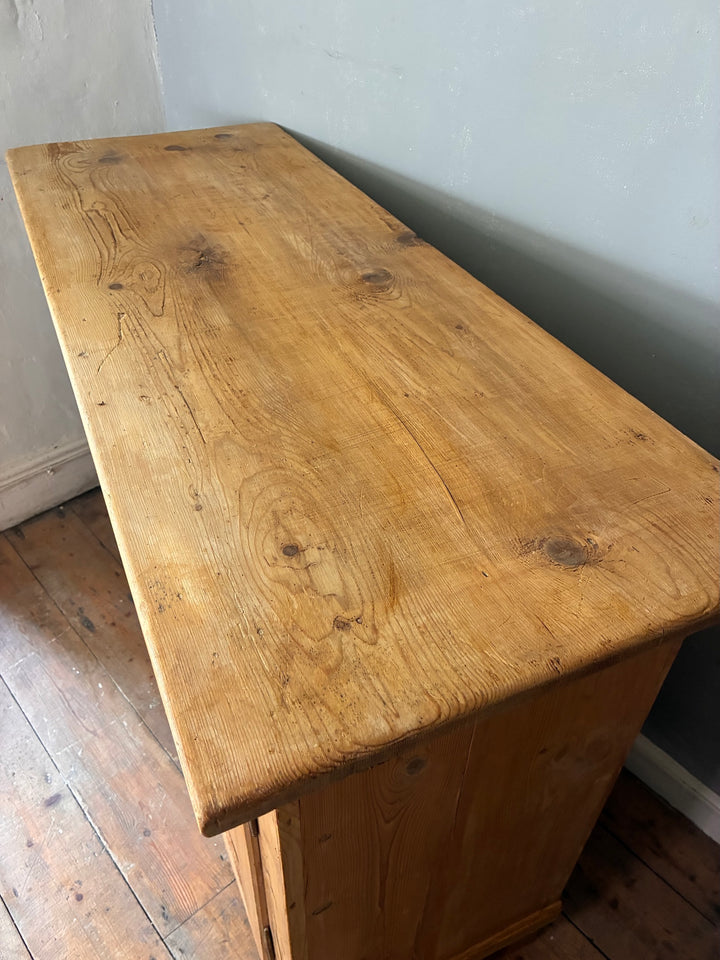 Rustic Antique Pine French Cupboard showing the beautiful aged wood top and natural patina.