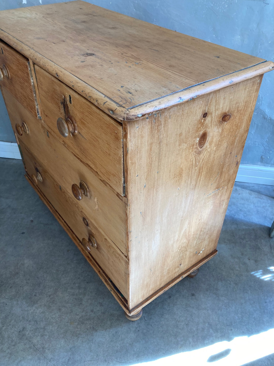 Rustic Victorian Pine Chest of Drawers with original elm knobs and turned feet, sourced from Source for the Goose, Devon.