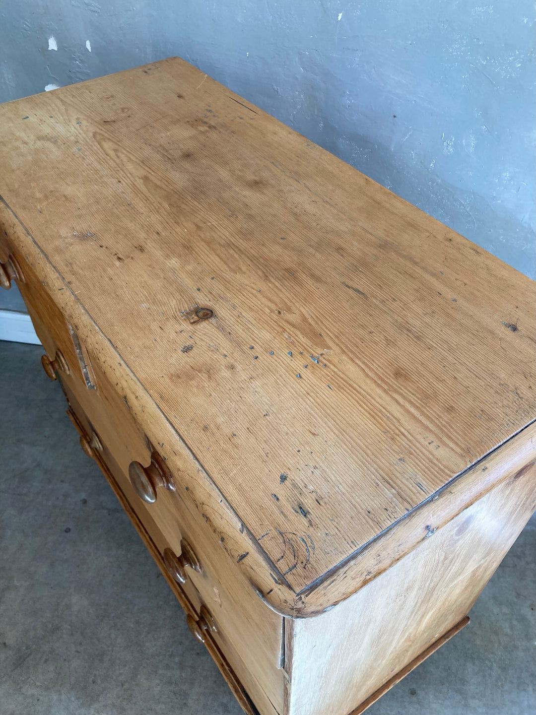 Top view of rustic Victorian Pine Chest of Drawers by Source for the Goose, showcasing its waxed finish and elm knobs.