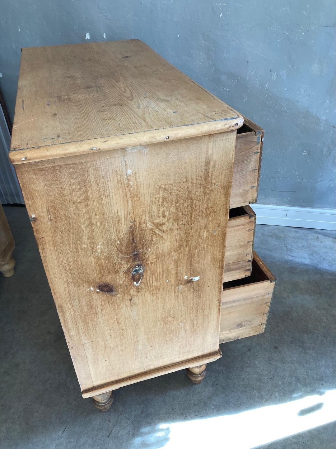 Rustic Victorian Pine Chest of Drawers with turned feet and elm knobs, offering ample storage space.