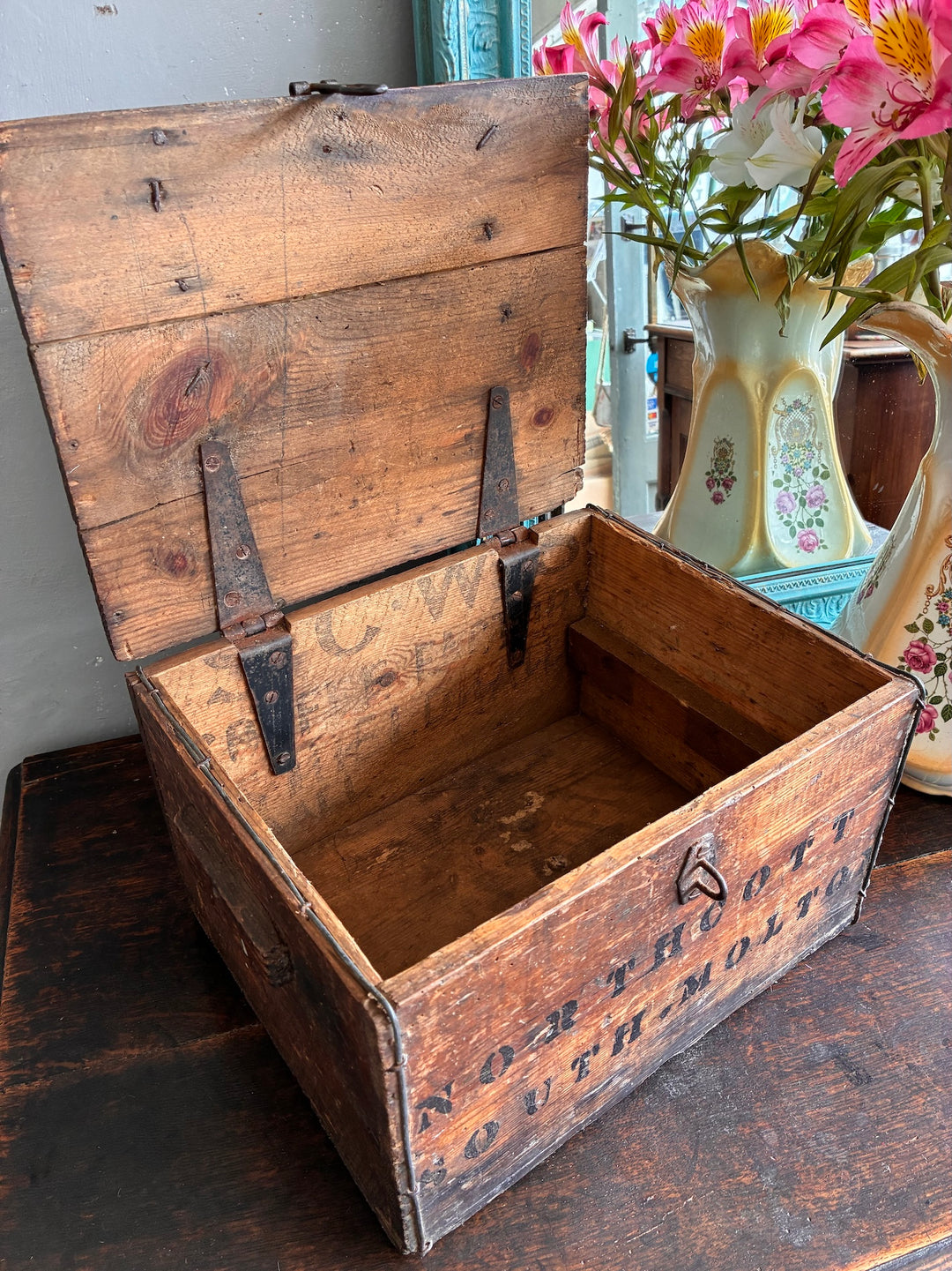 Rustic wooden box with hinged lid from reclaimed coffee crate, featuring stenciled text, perfect for storage and decor.