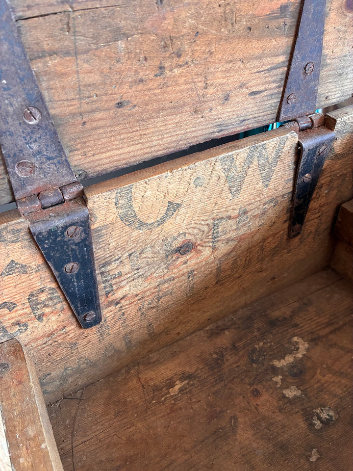 Rustic wooden box interior showing sturdy hinges and vintage stenciling, perfect for keepsakes from Source for the Goose, Devon.