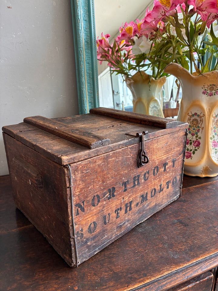 Rustic wooden box with hinged lid from Source for the Goose, featuring Northcott and South Molton stenciled design.