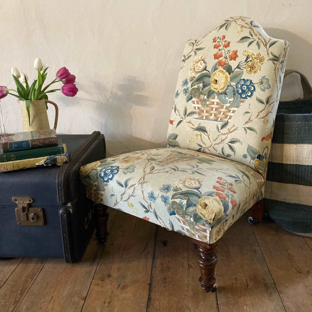 small Antique Nursing Chair on wooden legs and castors for sale at Source for the Goose, Devon