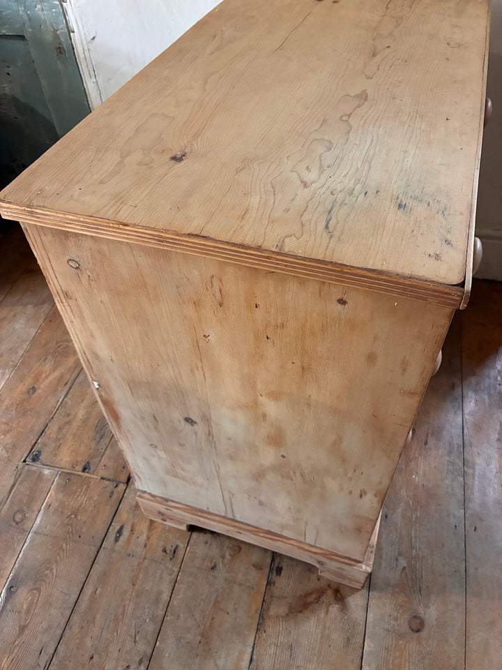 Small Antique Victorian Pine Chest of Drawers showcasing rustic charm and classic design details.