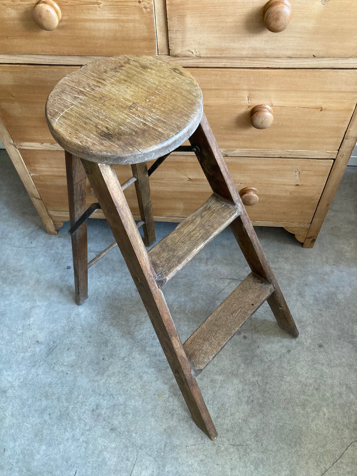 Small vintage step ladder with two steps and round top, perfect for displaying plants or lamps, from Source for the Goose, Devon.