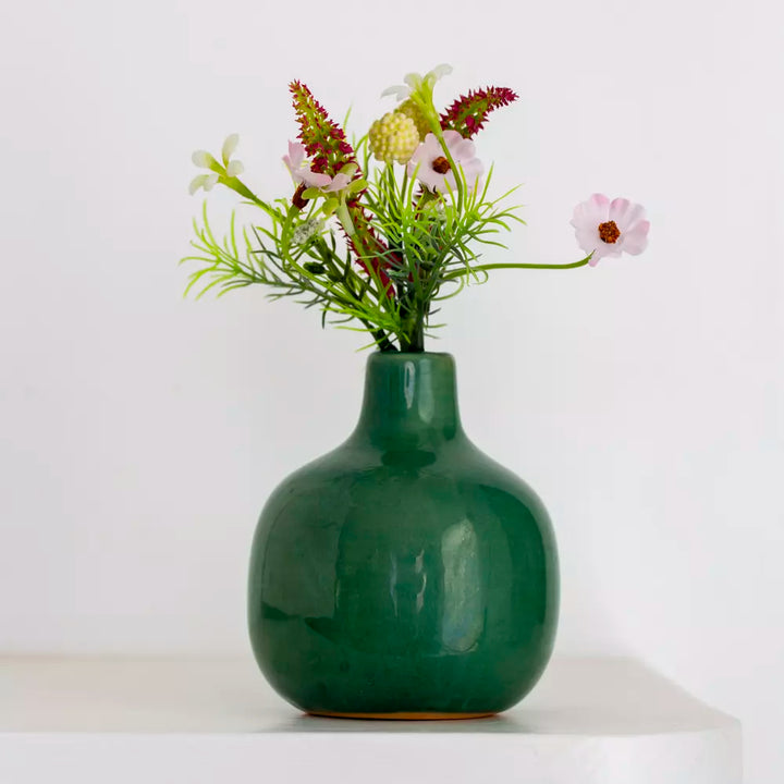Dainty ceramic bud vase in vibrant green with flowers, charming home decor from Source for the Goose, Devon.