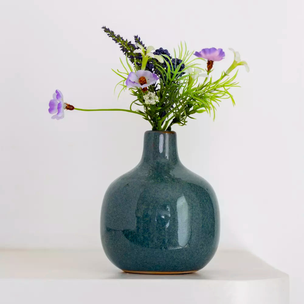 Dainty ceramic bud vase in calming jade green with flowers, perfect for home decor by Source for the Goose, Devon.