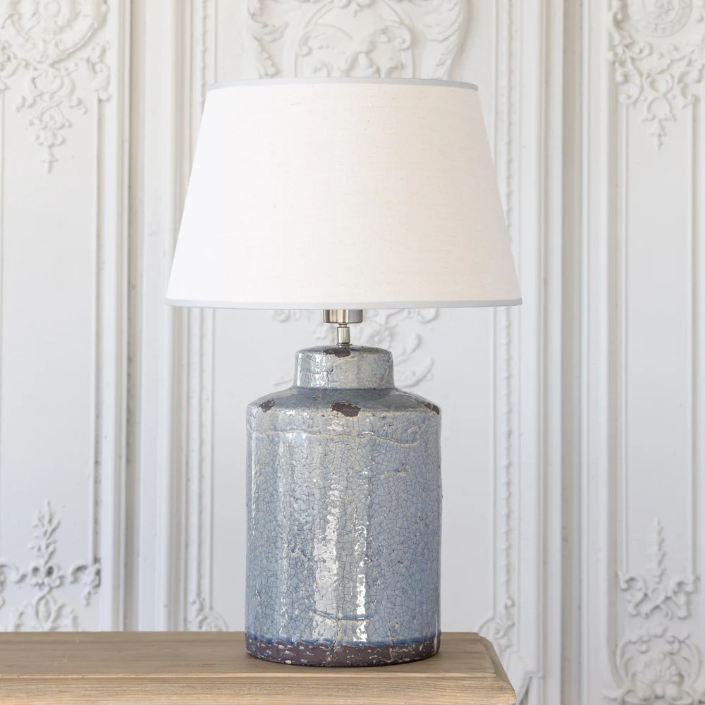 Tall blue crackle glaze stoneware table lamp with linen shade, perfect for home decor by Source for the Goose, Devon.