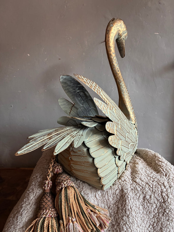 Regal Verdigris Decorative Swan with a greenish patina and tassels, perfect for vintage and contemporary decor.