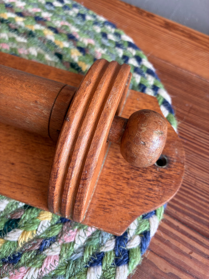 Vintage French wooden towel holder with lift-out rail, showcasing rustic charm for country-style kitchens.