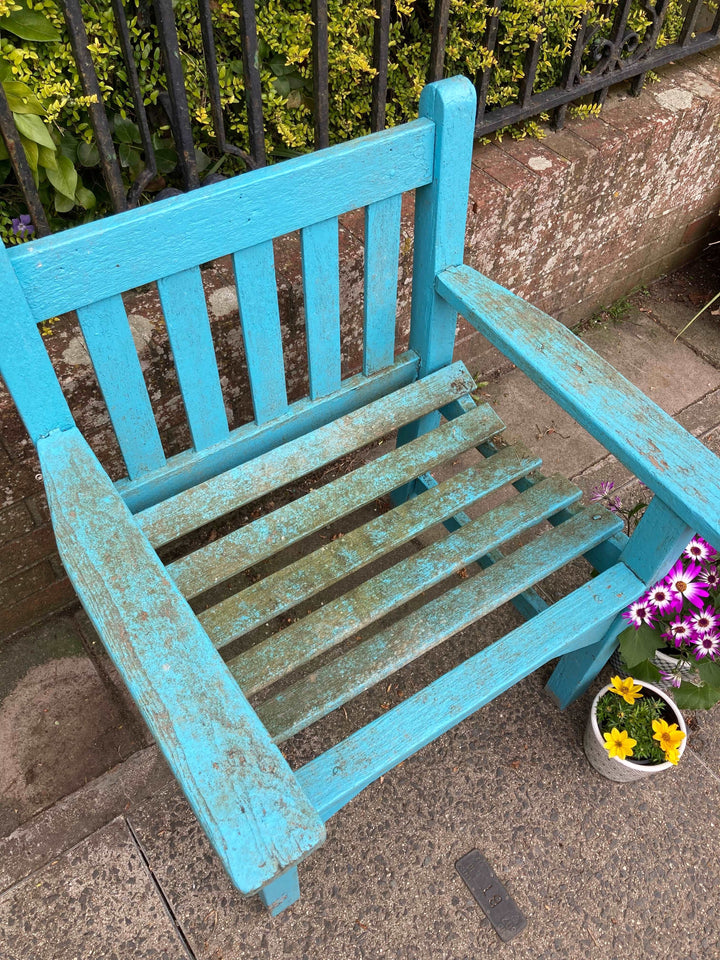 wide seated wooden blue garden chair 