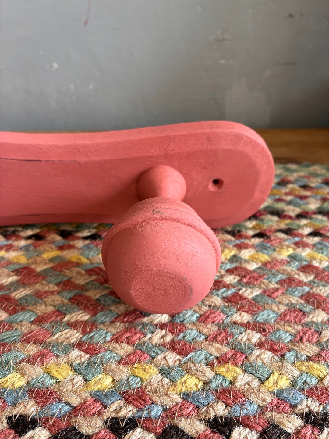 Earthy Pink Vintage French Coat Hooks close-up showing soft salmon pink finish and distressed details.
