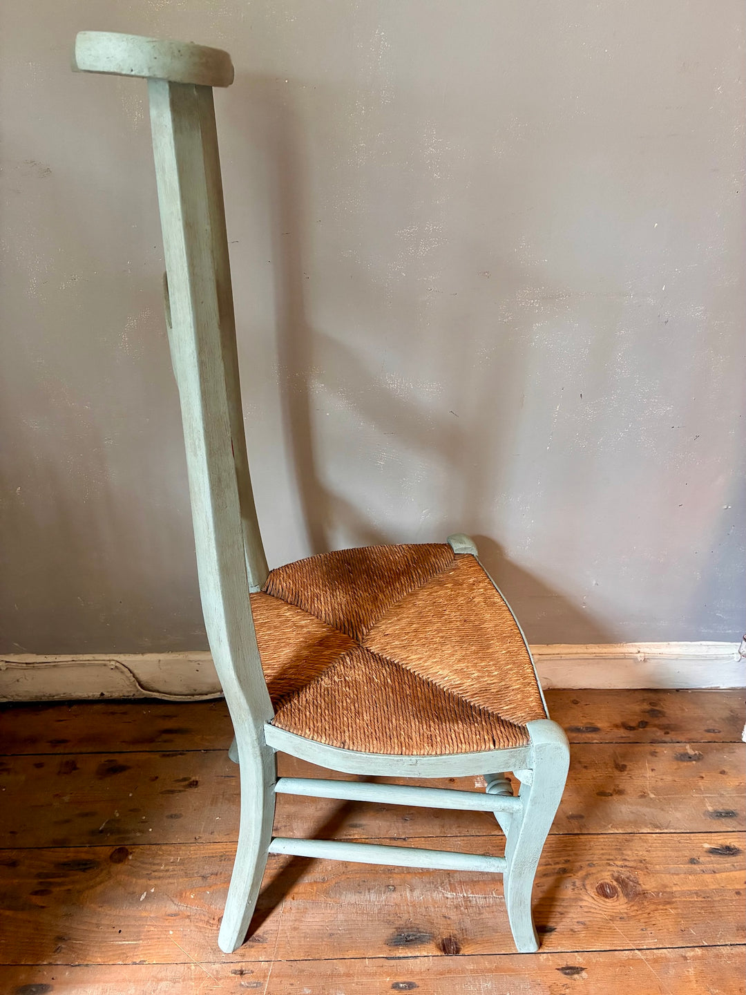 French Vintage Painted Prayer Chair - Prie Dieu showcased with a rush seat and soft duck egg blue color.