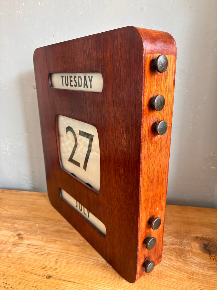 Vintage Wall Hanging Perpetual Calendar displayed, showing date and day in retro wooden case.