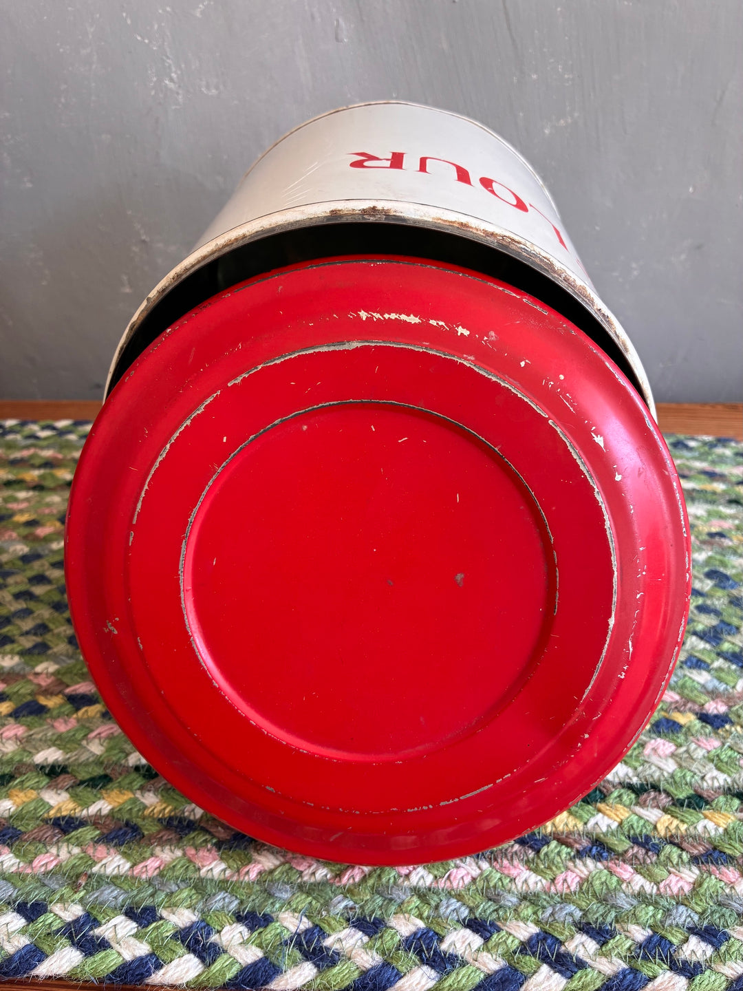 Vintage Red and White Tala Flour Bin showcasing a rustic worn finish, ideal for retro kitchen decor from Source for the Goose, Devon.
