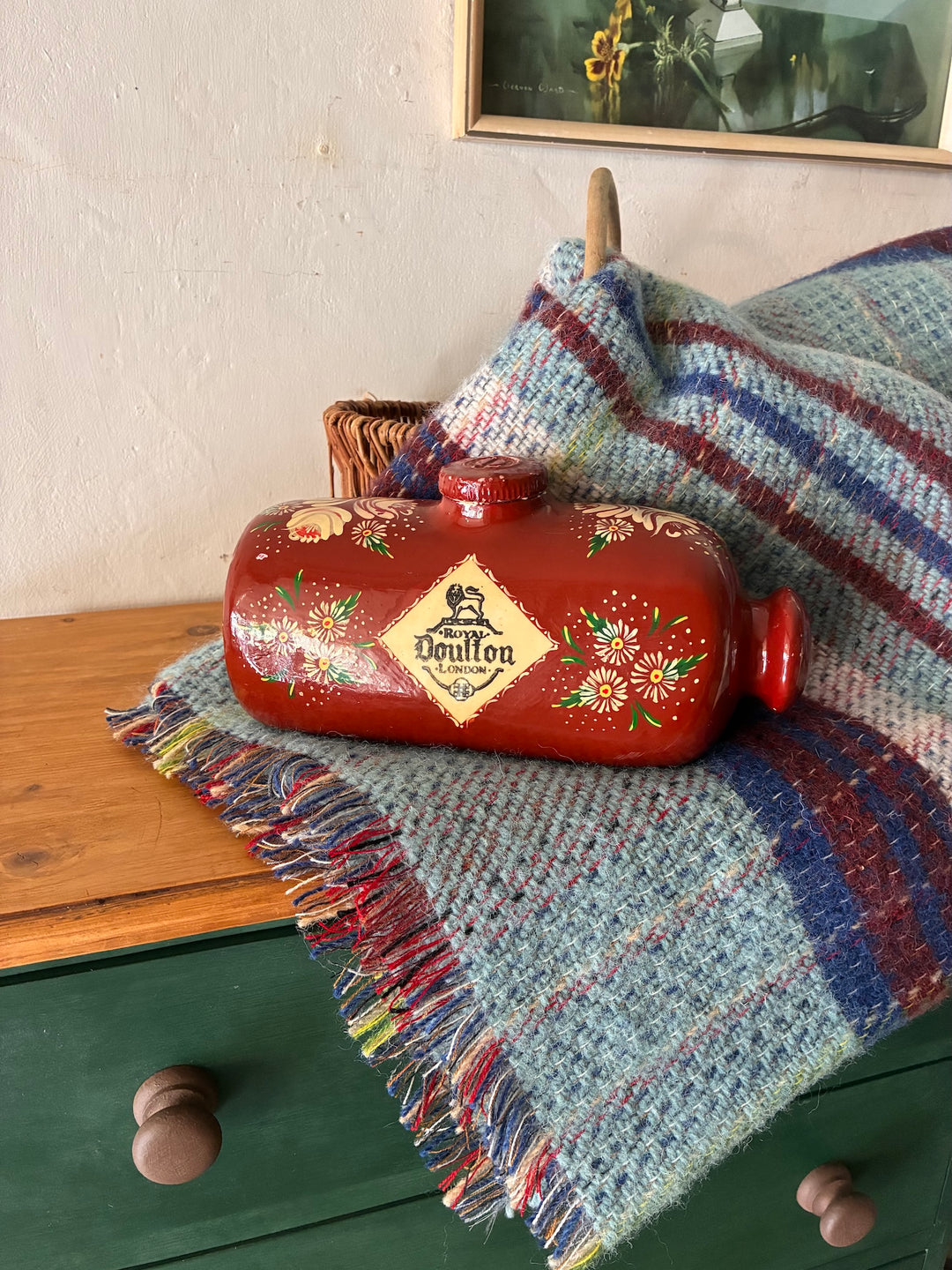 Vintage Royal Doulton Stoneware Foot Warmer - Painted Toleware displayed on a blue woven blanket.