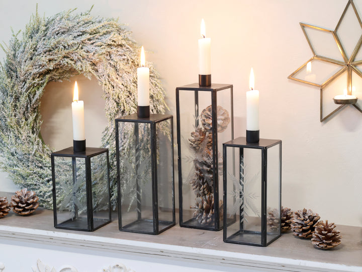 square glass and black metal candleholders