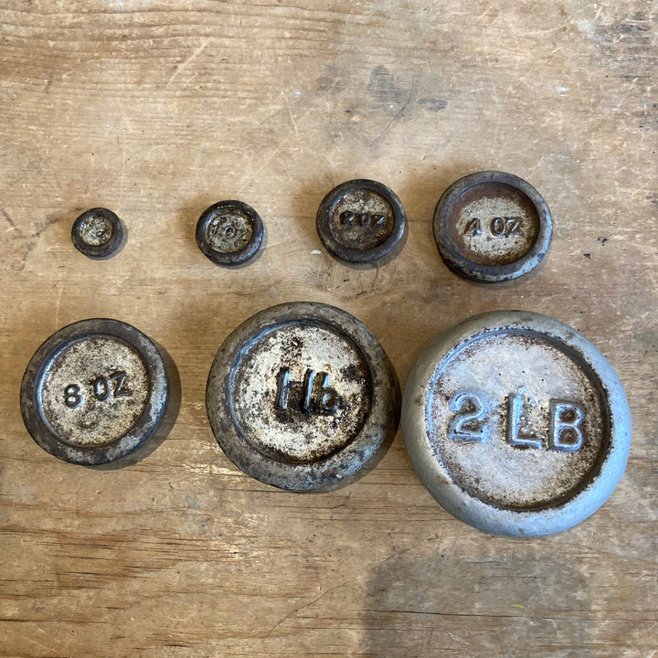 vintage set of weights belonging to 1950s kitchen scales