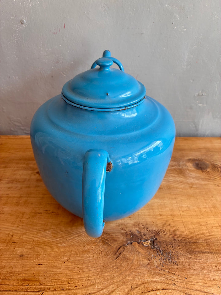 Large Vintage Blue Enamel Teapot with dual handles on a wooden surface, showcasing its charming patina.