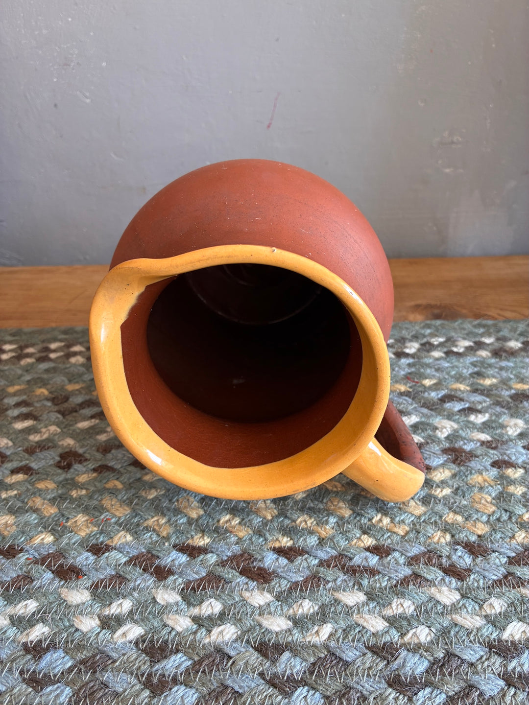 Vintage Terracotta Jug - Yellow Glaze Rim viewed from above showcasing its unique design and warm color.