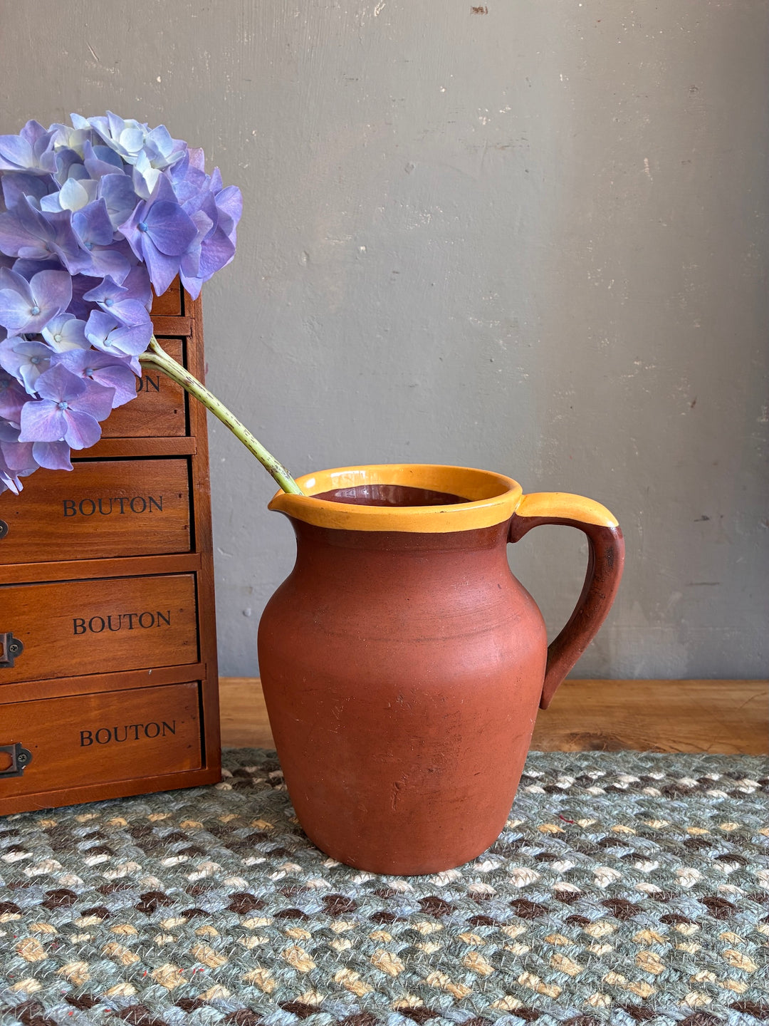 Vintage Terracotta Jug - Yellow Glaze Rim with flowers, rustic Devonware style, perfect for home decor.