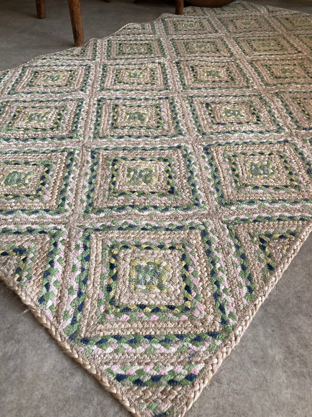 diamond design organic jute rug in green and natural tones