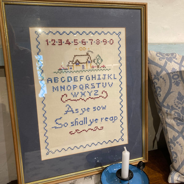 framed sampler with religious text