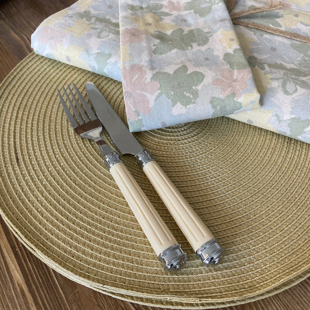 pastel floral  tablecloth, napkins and co-ordinating saffron yellow placemat