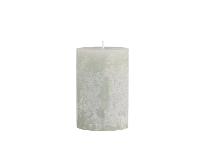 sage green pillar candle with marble effect finish