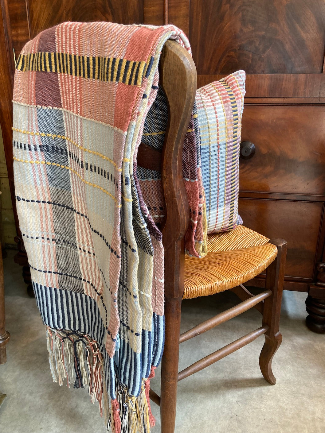 pink, blue and yellow check throw blanket by Weaver Green at Source for the Goose, UK
